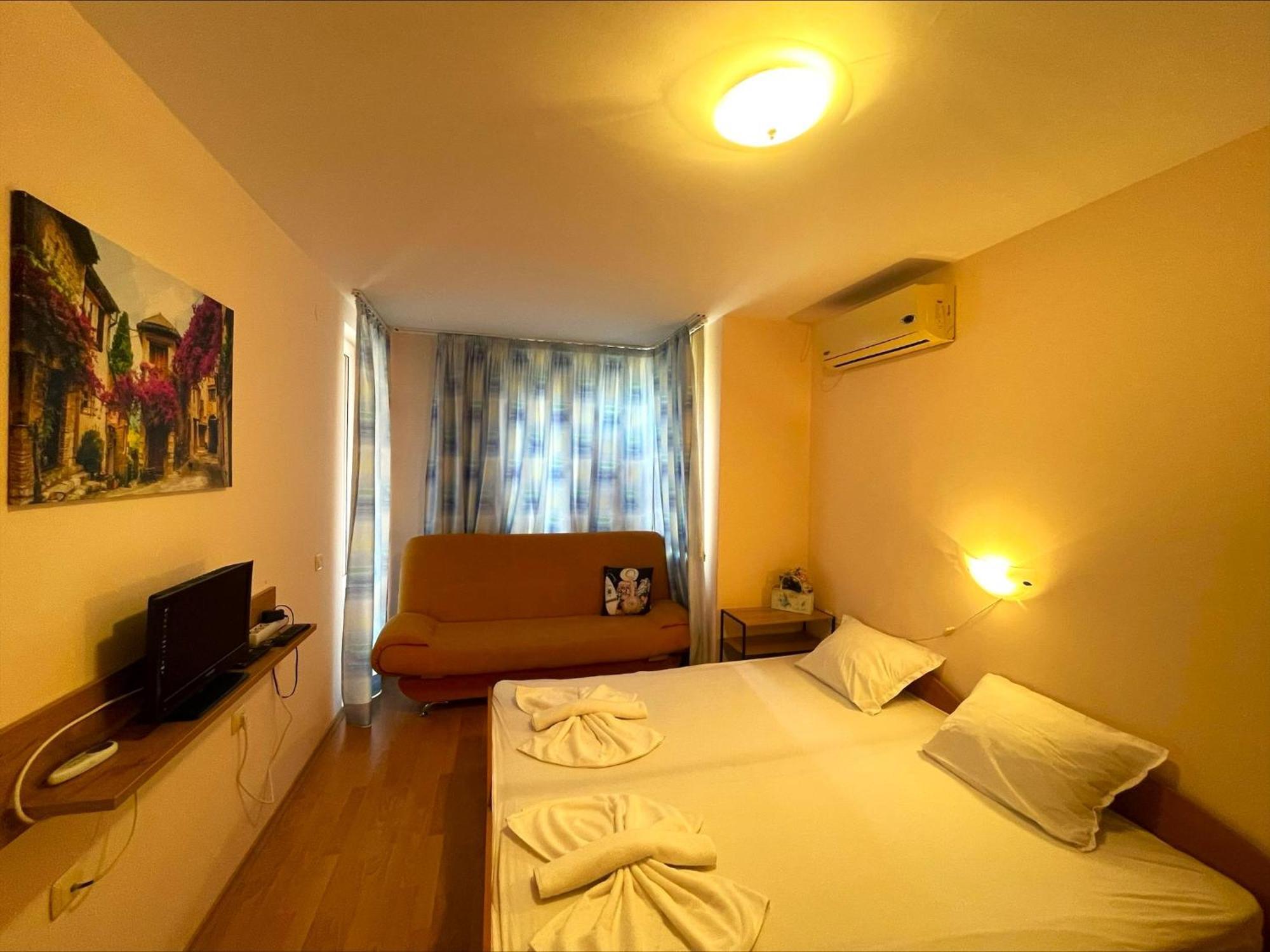 Holiday-Orchid Menada Apartments Pantai Sunny Ruang foto
