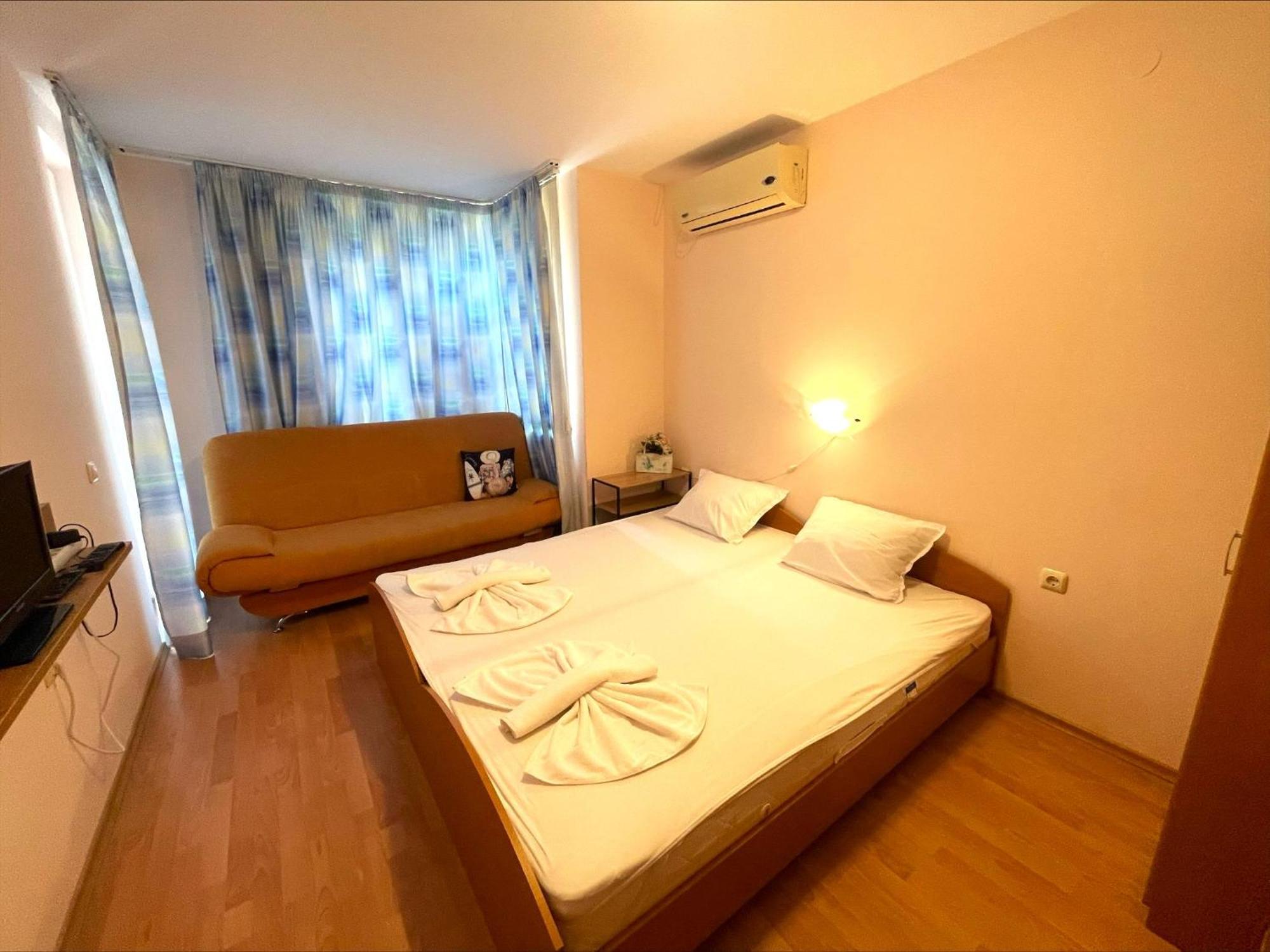 Holiday-Orchid Menada Apartments Pantai Sunny Ruang foto